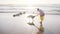 Woman playing with dog at the beach