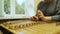 Woman playing the dulcimer in the College of Music