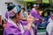 Woman playing Japanese traditional music instrument at summer festival