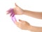 Woman playing with purple slime. Antistress toy