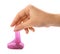 Woman playing with purple slime on white, closeup. Antistress toy