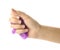 Woman playing with purple slime on white, closeup. Antistress toy