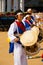 Woman Playing Traditional Korean Drums