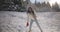 Woman Playing Winter Game, Throwing Snowball in Mountain Forest Outdoors