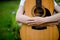 woman plays the guitar happily. Cute, bright, happy to play music that loves music concepts