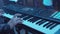 Woman plays by hands on white digital piano, close-up shooting with defocus. Stock. Girl is playing by fingers on