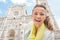 Woman pointing on duomo in florence, italy