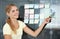 Woman, pointing and sticky notes on glass wall, graph and smile for seminar, creative and portrait. Presentation