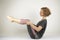 Woman portrait breathing while doing yoga exercises. Balance practice