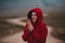 Woman portrait in cold wind in mountains