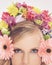 Woman, portrait and flowers on crown for beauty, confidence and wellness with spring aesthetic and floral art. Model