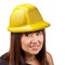 Woman portrait hard yellow helmet