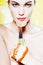 Woman Portrait holding a orange tangerine fruit slice