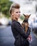 Woman, portrait and leather jacket with dog, happy and rock n roll for unique in punk fashion and city for pet chihuahua