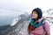 Woman posing on observation deck of Ai-Petri mountain peak