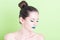 Woman posing with professional green trendy make-up