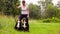 Woman posing with two bernese shepherd dogs