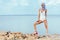 woman posing in white vintage swimsuit