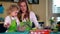 Woman pour oil into cake dough and little helper daughter girl mixing with spoon