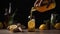 Woman pouring from bottle fresh kombucha with lemon and ginger into glass, generative ai