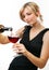 Woman pouring a glass of red wine