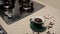 Woman pouring hot aromatic coffee into cup at table, closeup. Lazy morning