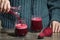 Woman Pouring Self Made Beet Juice