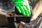 The woman pours the soil into seedling molds