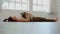 Woman practice yoga with dog pug breed enjoy and relax with yoga at home