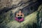 Woman practice yoga meditation in small cave