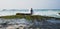 Woman practice yoga at the seaside