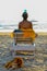 Woman practicing balance and awareness at beach of Goa