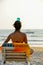 Woman practicing balance and awareness at beach of Goa