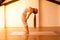 Woman practicing Yoga in a Attic