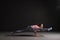 Woman practicing yoga, doing chaturanga dandasana variation