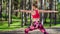 Woman practicing yoga in a forest. Warrior pose. Calmness, relax, mind and body happiness concept
