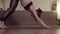Woman practicing yoga in nice studio - handstanding balance