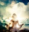 Woman Practicing Yoga by the Sea. Bokeh Background