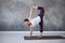 Woman practicing yoga standing in Half Moon exercise, Ardha Chandrasana pose