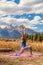 Woman Practicing Yoga in the Tetons in Fall