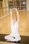 Woman practicing yoga in upward bound finger pose