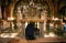 Woman praying at the 12th Station of the Cross, Golgotha calvary hill, The Church of the Holy Sepulchre in Jerusalem