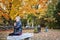 Woman praying in cemetery