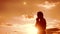 Woman praying on her knees. Girl folded her hands in prayer lifestyle silhouette at sunset. slow motion video. Girl