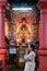 Woman praying at a vietnamese temple