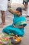 Woman during pregnancy ritual at Amma Mandapam.