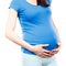 Woman in pregnant with stomach pain touching her belly, aches in pregnancy and risk of miscarriage