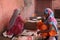 Woman prepare Chapathi bread in kitchen in a village, Uttar Pradesh, India