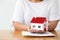 Woman prepare documents for the bank to borrow money to buy a house