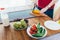 Woman prepare food, cutting corn. Vegetables. Cooking salad